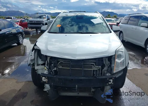 2012 Cadillac Srx Luxury Collection z USA, uszkodzony, nr VIN 3GYFNDE30CS598801